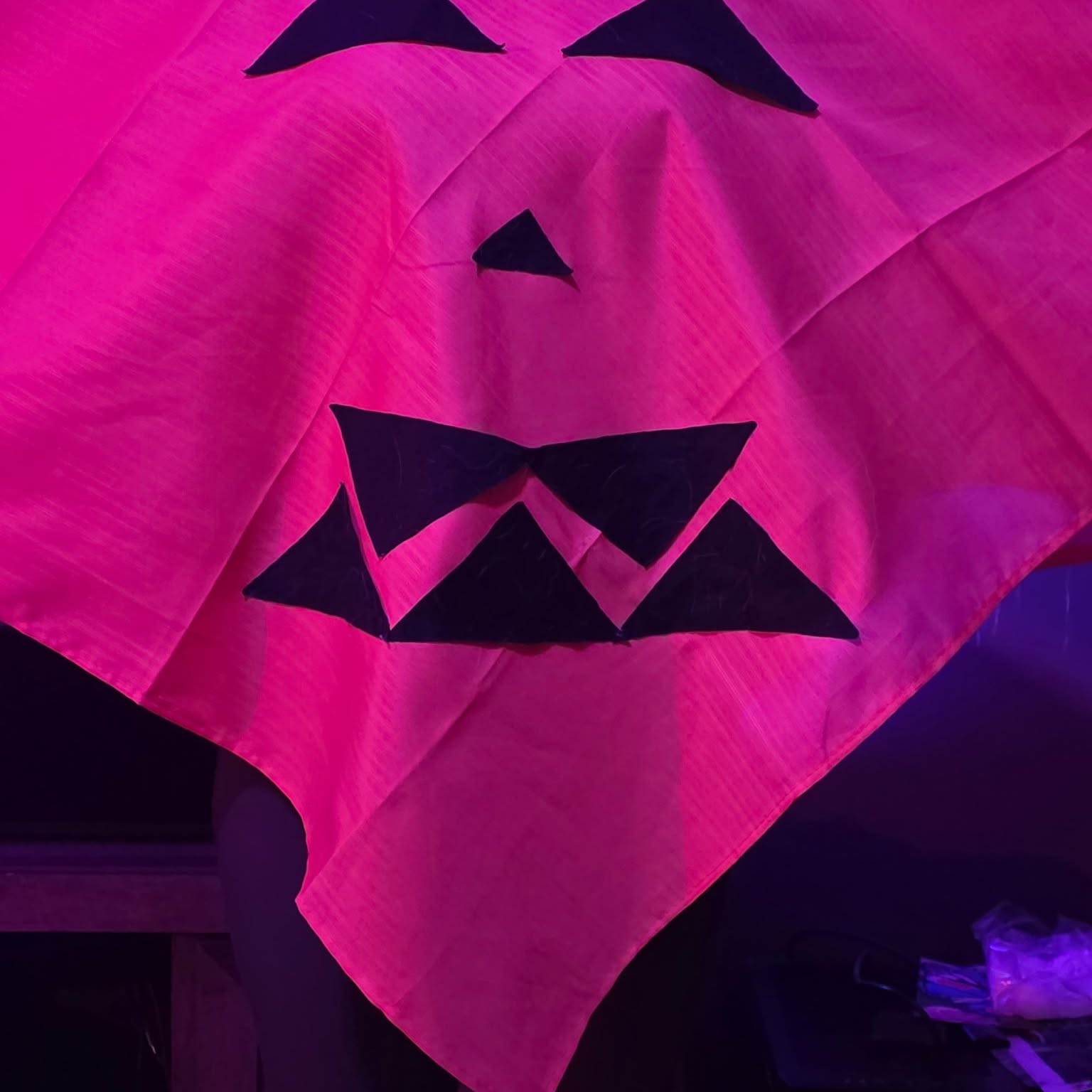 The Drain Wizards Halloween costume — a pink jack-o-lantern